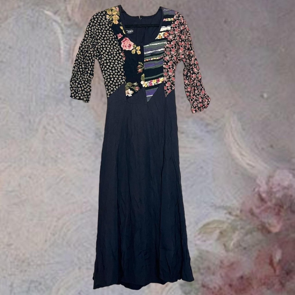 Black and multi-coloured floral patchwork midi dress. 3/4 sleeve. Zips in back